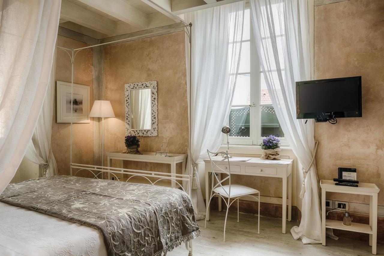 Relais Villa Vittoria Laglio Bagian luar foto