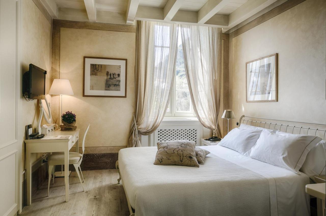 Relais Villa Vittoria Laglio Bagian luar foto
